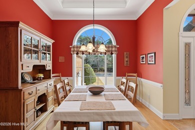 Love to entertain while enjoying stunning views of the pond and on Members Club At St. James Plantation in North Carolina - for sale on GolfHomes.com, golf home, golf lot