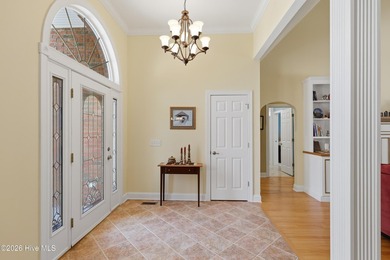 Love to entertain while enjoying stunning views of the pond and on Members Club At St. James Plantation in North Carolina - for sale on GolfHomes.com, golf home, golf lot