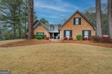 Welcome home to this beautiful 4-bedroom, 2.5-bath all-brick on Honey Creek Country Club in Georgia - for sale on GolfHomes.com, golf home, golf lot