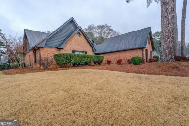 Welcome home to this beautiful 4-bedroom, 2.5-bath all-brick on Honey Creek Country Club in Georgia - for sale on GolfHomes.com, golf home, golf lot