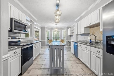 Welcome home to this lovely 3BR/2.5BA home in the desirable on Kings Grant Golf and Country Club in North Carolina - for sale on GolfHomes.com, golf home, golf lot