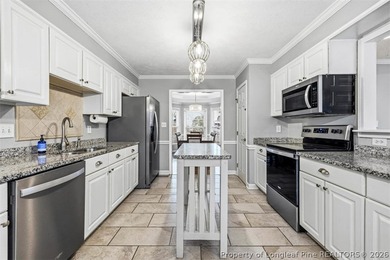 Welcome home to this lovely 3BR/2.5BA home in the desirable on Kings Grant Golf and Country Club in North Carolina - for sale on GolfHomes.com, golf home, golf lot