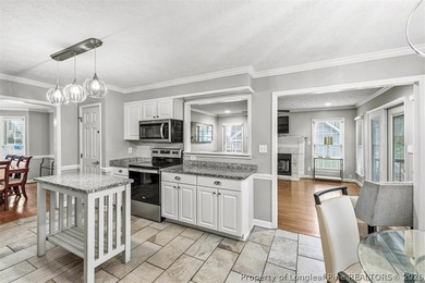 Welcome home to this lovely 3BR/2.5BA home in the desirable on Kings Grant Golf and Country Club in North Carolina - for sale on GolfHomes.com, golf home, golf lot