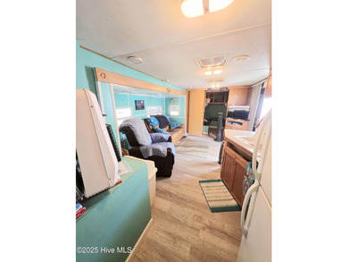 GIVE THE GIFT OF YOUR OWN PLACE AT THE BEACH! SELLER IS on North Shore Country Club in North Carolina - for sale on GolfHomes.com, golf home, golf lot