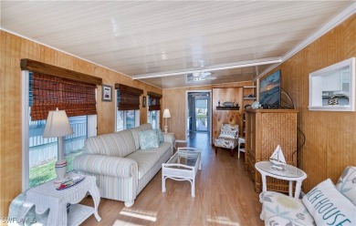 Beautifully maintained and upgraded remodeled lakefront on Del Tura Golf and Country Club in Florida - for sale on GolfHomes.com, golf home, golf lot