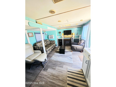 GIVE THE GIFT OF YOUR OWN PLACE AT THE BEACH! SELLER IS on North Shore Country Club in North Carolina - for sale on GolfHomes.com, golf home, golf lot