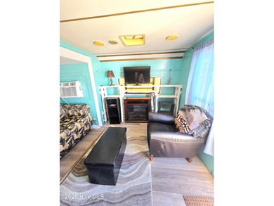 GIVE THE GIFT OF YOUR OWN PLACE AT THE BEACH! SELLER IS on North Shore Country Club in North Carolina - for sale on GolfHomes.com, golf home, golf lot