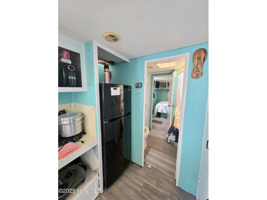 GIVE THE GIFT OF YOUR OWN PLACE AT THE BEACH! SELLER IS on North Shore Country Club in North Carolina - for sale on GolfHomes.com, golf home, golf lot