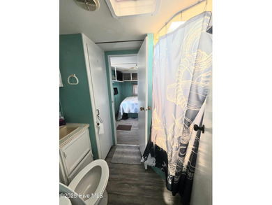 GIVE THE GIFT OF YOUR OWN PLACE AT THE BEACH! SELLER IS on North Shore Country Club in North Carolina - for sale on GolfHomes.com, golf home, golf lot