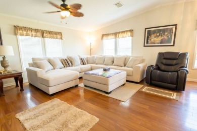 Welcome to your idyllic retreat at 1426 Whispering Pines Loop on Lily Lake Golf and RV Resort in Florida - for sale on GolfHomes.com, golf home, golf lot