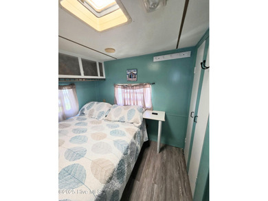 GIVE THE GIFT OF YOUR OWN PLACE AT THE BEACH! SELLER IS on North Shore Country Club in North Carolina - for sale on GolfHomes.com, golf home, golf lot