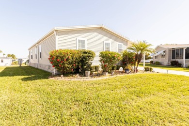 Welcome to your idyllic retreat at 1426 Whispering Pines Loop on Lily Lake Golf and RV Resort in Florida - for sale on GolfHomes.com, golf home, golf lot
