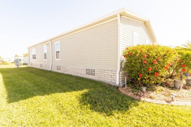 Welcome to your idyllic retreat at 1426 Whispering Pines Loop on Lily Lake Golf and RV Resort in Florida - for sale on GolfHomes.com, golf home, golf lot