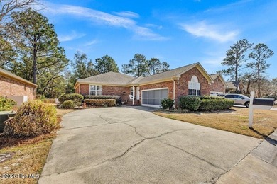Beautiful brick 3-bedroom, 2-bath home located in the highly on Masonboro Country Club in North Carolina - for sale on GolfHomes.com, golf home, golf lot