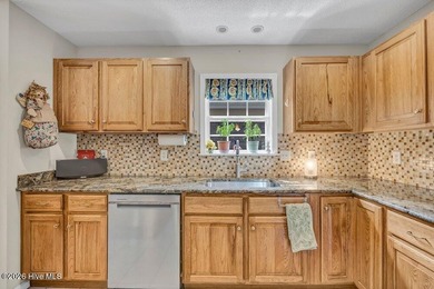 Beautiful brick 3-bedroom, 2-bath home located in the highly on Masonboro Country Club in North Carolina - for sale on GolfHomes.com, golf home, golf lot