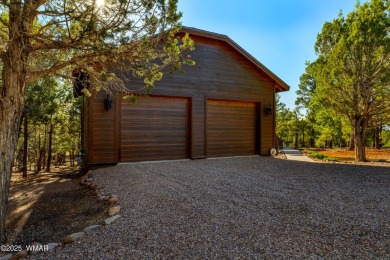 Beautiful corner lot cabin in Show Low's Torreon Golf community on Torreon Golf Club in Arizona - for sale on GolfHomes.com, golf home, golf lot