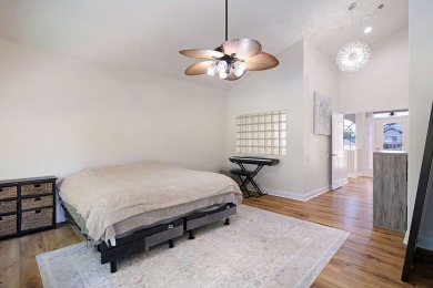 Beautifully updated with idyllic views of the fifteenth hole on Emerald Bay Golf Club in Florida - for sale on GolfHomes.com, golf home, golf lot
