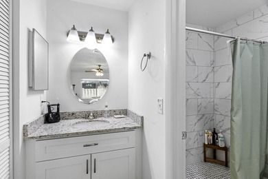 Nestled on a quiet street, this turnkey CBS townhouse has been on The Golf Club of Jupiter in Florida - for sale on GolfHomes.com, golf home, golf lot