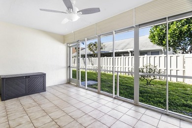 Nestled on a quiet street, this turnkey CBS townhouse has been on The Golf Club of Jupiter in Florida - for sale on GolfHomes.com, golf home, golf lot