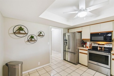 Welcome to 676 Augusta, a charming and well-maintained home on Cypresswood Golf and Country Club in Florida - for sale on GolfHomes.com, golf home, golf lot