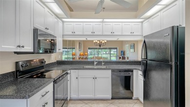 This desirable villa boast a recently installed roof, HVAC on University Park Country Club in Florida - for sale on GolfHomes.com, golf home, golf lot