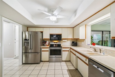 Welcome to 676 Augusta, a charming and well-maintained home on Cypresswood Golf and Country Club in Florida - for sale on GolfHomes.com, golf home, golf lot