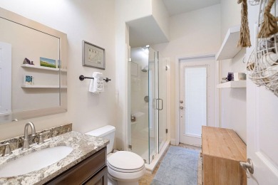 Beautifully updated with idyllic views of the fifteenth hole on Emerald Bay Golf Club in Florida - for sale on GolfHomes.com, golf home, golf lot