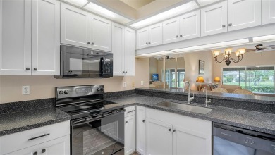 This desirable villa boast a recently installed roof, HVAC on University Park Country Club in Florida - for sale on GolfHomes.com, golf home, golf lot