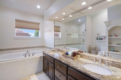 Beautifully updated with idyllic views of the fifteenth hole on Emerald Bay Golf Club in Florida - for sale on GolfHomes.com, golf home, golf lot