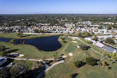 Nestled on a quiet street, this turnkey CBS townhouse has been on The Golf Club of Jupiter in Florida - for sale on GolfHomes.com, golf home, golf lot