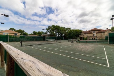 Beautifully updated with idyllic views of the fifteenth hole on Emerald Bay Golf Club in Florida - for sale on GolfHomes.com, golf home, golf lot