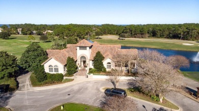 Beautifully updated with idyllic views of the fifteenth hole on Emerald Bay Golf Club in Florida - for sale on GolfHomes.com, golf home, golf lot