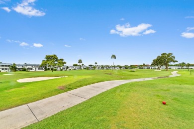 Begin your next chapter of life in Florida in the immaculately on Kings Point Golf - Executive in Florida - for sale on GolfHomes.com, golf home, golf lot