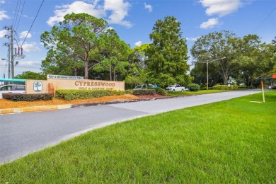 Welcome to 676 Augusta, a charming and well-maintained home on Cypresswood Golf and Country Club in Florida - for sale on GolfHomes.com, golf home, golf lot