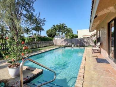 Located in the family-oriented neighborhood of Escondido, this on Boca Lago Golf and Country Club in Florida - for sale on GolfHomes.com, golf home, golf lot