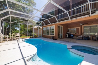Beautifully updated with idyllic views of the fifteenth hole on Emerald Bay Golf Club in Florida - for sale on GolfHomes.com, golf home, golf lot