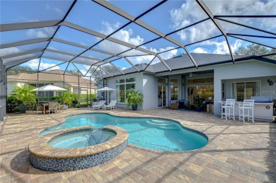 Completely Remodeled Gem with Expansive Screened Lanai, Outdoor on River Hills Country Club in Florida - for sale on GolfHomes.com, golf home, golf lot