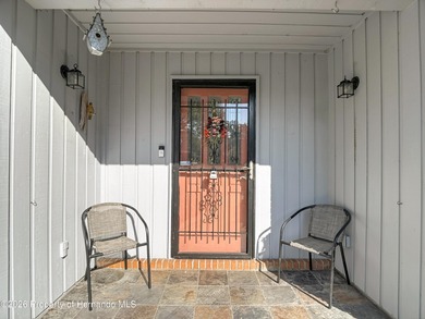 Welcome to your dream home in Whispering Oaks, where comfort on The Ridge Manor Oaks Golf and Country Club in Florida - for sale on GolfHomes.com, golf home, golf lot