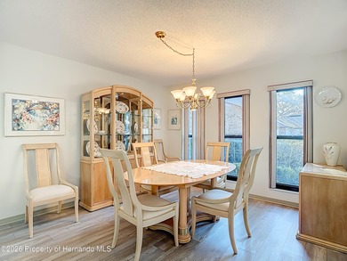 Welcome to your dream home in Whispering Oaks, where comfort on The Ridge Manor Oaks Golf and Country Club in Florida - for sale on GolfHomes.com, golf home, golf lot