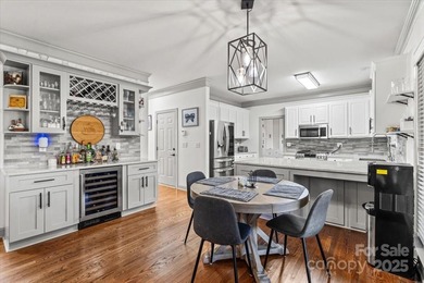 Discover this beautifully updated 4-bedroom 2.5-bath (plus huge on Northstone Country Club in North Carolina - for sale on GolfHomes.com, golf home, golf lot