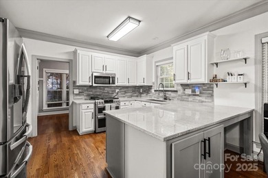 Discover this beautifully updated 4-bedroom 2.5-bath (plus huge on Northstone Country Club in North Carolina - for sale on GolfHomes.com, golf home, golf lot