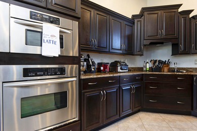 Just like a spread in Architectural Digest!Designed by architect on Ledgestone Country Club and Golf Course in Missouri - for sale on GolfHomes.com, golf home, golf lot