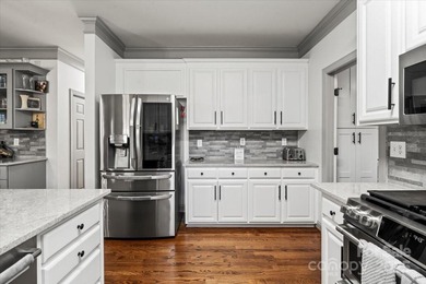 Discover this beautifully updated 4-bedroom 2.5-bath (plus huge on Northstone Country Club in North Carolina - for sale on GolfHomes.com, golf home, golf lot