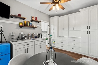 Discover this beautifully updated 4-bedroom 2.5-bath (plus huge on Northstone Country Club in North Carolina - for sale on GolfHomes.com, golf home, golf lot