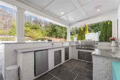 Tucked away on a quiet cul-de-sac in the prestigious Atlanta on Atlanta Country Club in Georgia - for sale on GolfHomes.com, golf home, golf lot