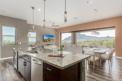 Picturesque Pinnacle Peak mountain, sunset and city light views on Troon Country Club in Arizona - for sale on GolfHomes.com, golf home, golf lot