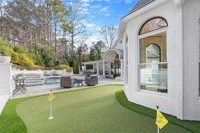 Tucked away on a quiet cul-de-sac in the prestigious Atlanta on Atlanta Country Club in Georgia - for sale on GolfHomes.com, golf home, golf lot
