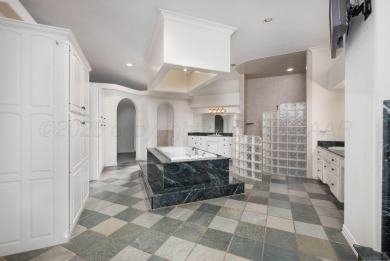 This beautifully built custom home offers quality craftsmanship on La Paloma Golf Club in Texas - for sale on GolfHomes.com, golf home, golf lot