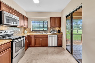 JUST REDUCED $10,000! Experience Country Club living without the on The Boca Country Club in Florida - for sale on GolfHomes.com, golf home, golf lot