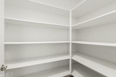 Picturesque Pinnacle Peak mountain, sunset and city light views on Troon Country Club in Arizona - for sale on GolfHomes.com, golf home, golf lot